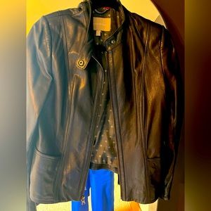 Beautiful black leather classic Moto style jacket.  Real leather - size medium